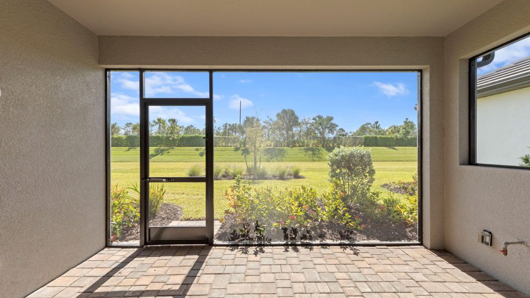 Exterior details and patio area of a home in SkySail, Naples (Image 20).