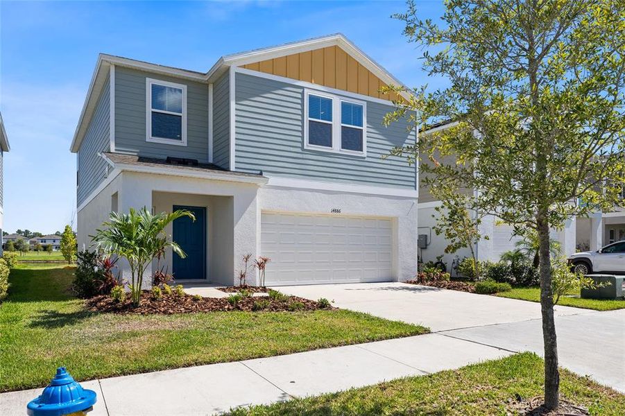 Front exterior of a new home in New Home Communities Near Tampa, Ocala, and Orlando, Florida, Lithia, FL, highlighting curb appeal (Image 21). Front exterior of a new home in New Home Communities Near Tampa, Ocala, and Orlando, Florida, Lithia, FL, highlighting curb appeal (Image 21).