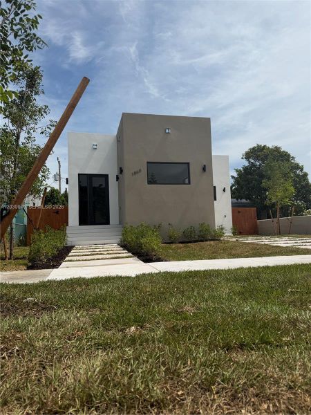 Front exterior of a new home in , Miami, FL, highlighting curb appeal (Image 22). Front exterior of a new home in , Miami, FL, highlighting curb appeal (Image 22).
