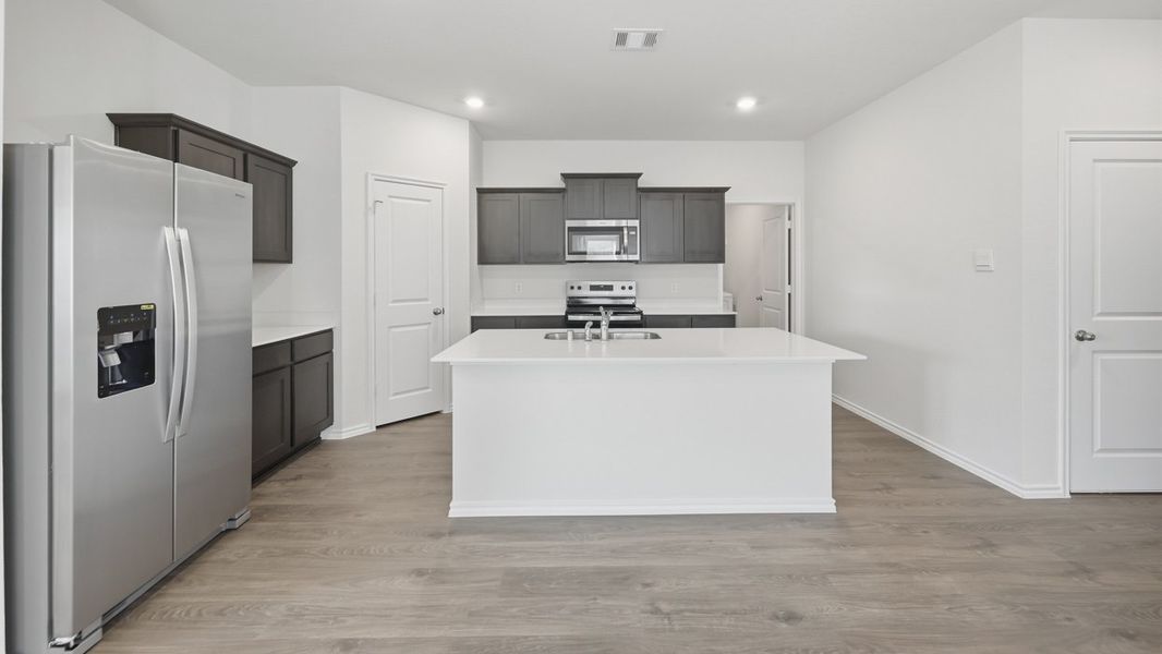 Representative furnished interior of a home built from the Perry by D.R. Horton in Whitewing Trails, Princeton (Image 4).
