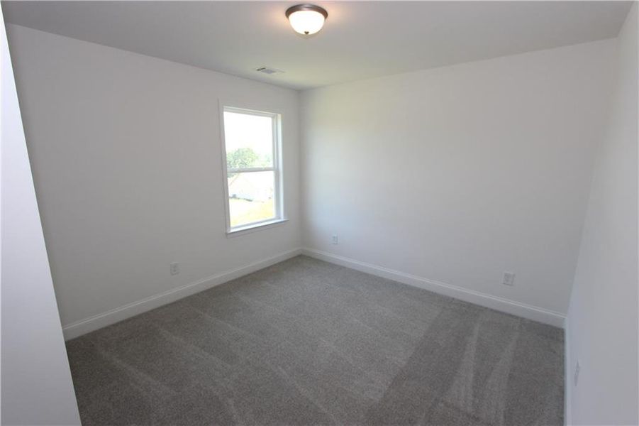 Spacious, unfurnished interior of a new home in Clark Farms, Flowery Branch (Image 20).
