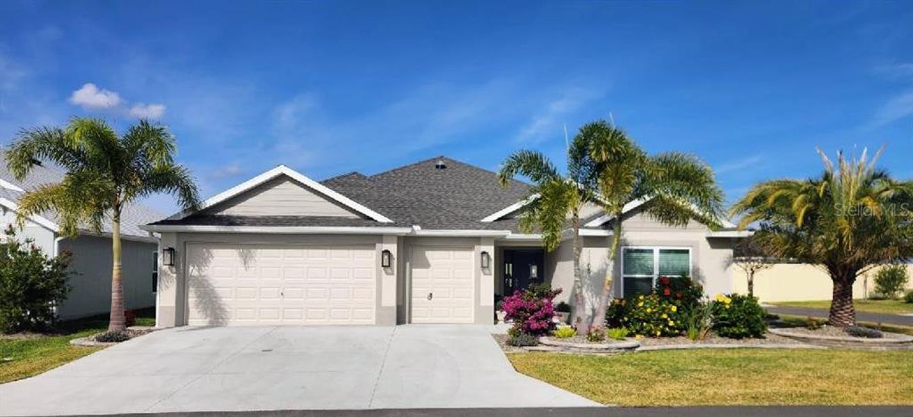 Front exterior of a new home in , The Villages, FL, highlighting curb appeal (Image 3). Front exterior of a new home in , The Villages, FL, highlighting curb appeal (Image 3).