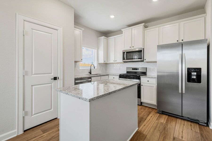 Furnished interior view inside a new home in Sweetwater Ridge, Conroe (Image 6).