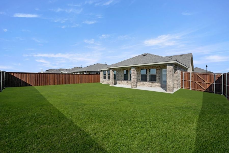 Front exterior of a new home in Myrtle Creek, Waxahachie, TX, highlighting curb appeal (Image 28). Front exterior of a new home in Myrtle Creek, Waxahachie, TX, highlighting curb appeal (Image 28).