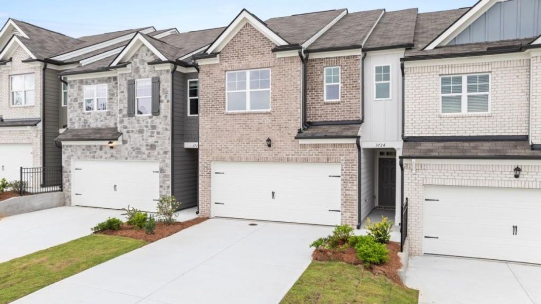 Front exterior of a new home in Carlton, Douglasville, GA, highlighting curb appeal (Image 1). Front exterior of a new home in Carlton, Douglasville, GA, highlighting curb appeal (Image 1).