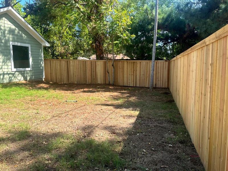 Newly added cedar fence