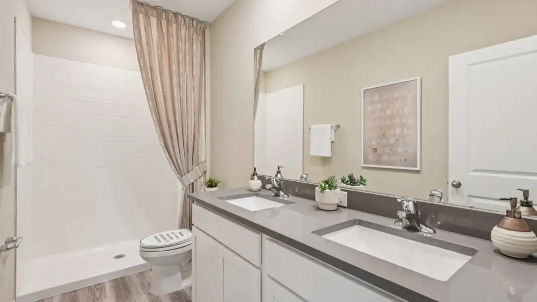Furnished interior view inside a new home in Towns at Woodsdale, Wesley Chapel (Image 27).