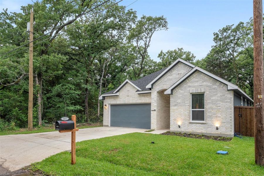 Front exterior of a new home in , Mabank, TX, highlighting curb appeal (Image 2). Front exterior of a new home in , Mabank, TX, highlighting curb appeal (Image 2).