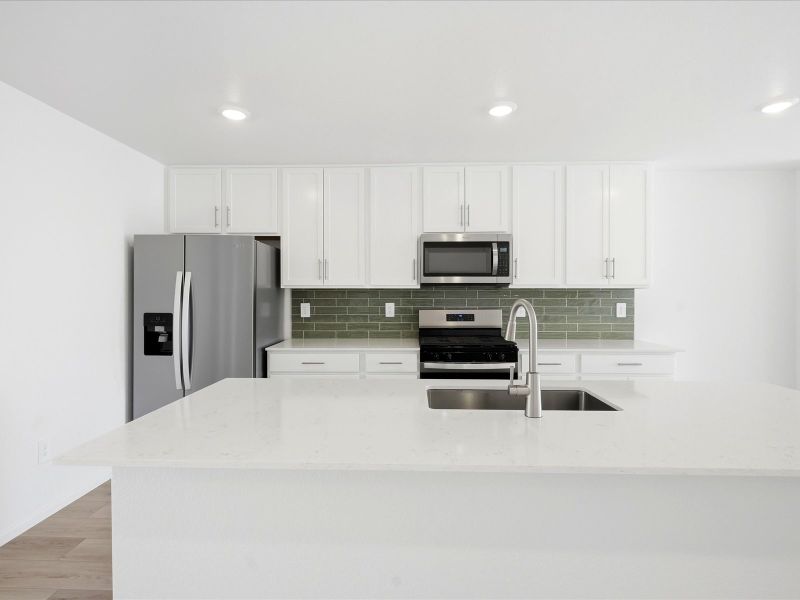 Furnished interior view inside a new home in Three Hills, Morrison (Image 5).