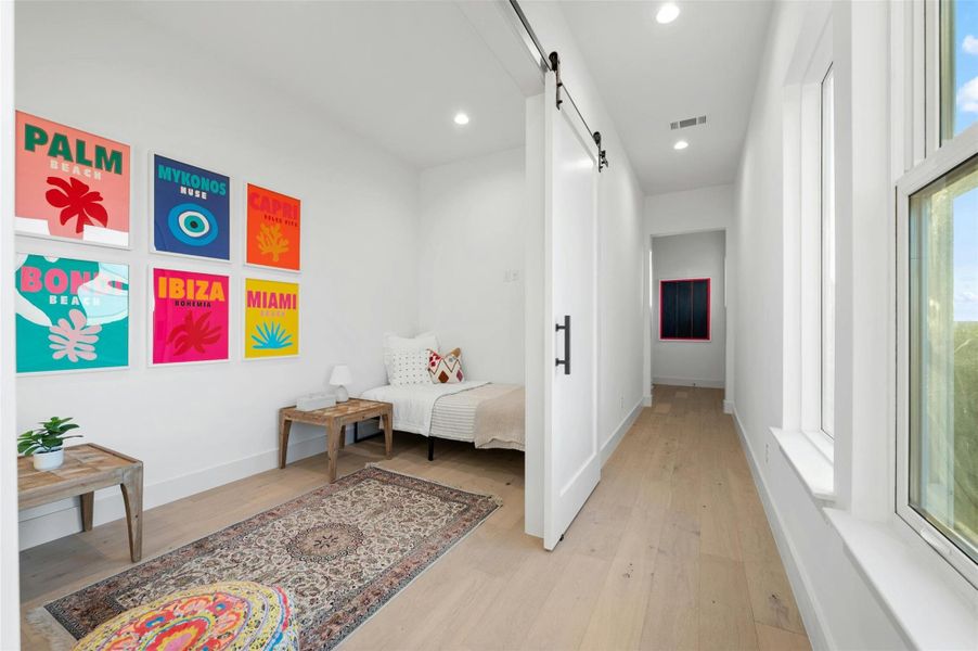 Along the hallway on the first floor you will find an awesome bonus room with flexibility for use of space. Perfect for a home office, craft room, music studio, or even additional guest accommodations.