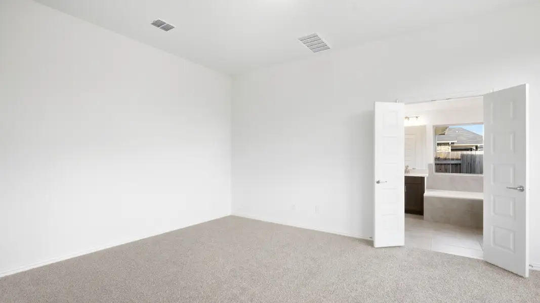 Furnished interior view inside a new home in Sunfield, Buda (Image 12).