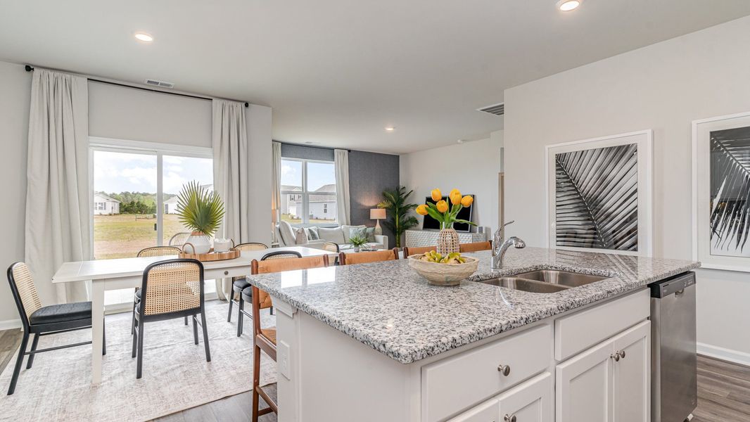 Furnished interior view inside a new home in Rich Square at Brunswick Plantation, Ash (Image 3).