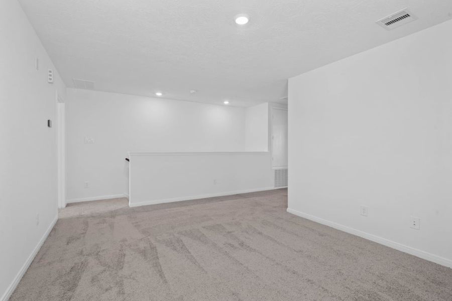 Spacious, unfurnished interior of a new home in Grace Landing, Willis (Image 17).