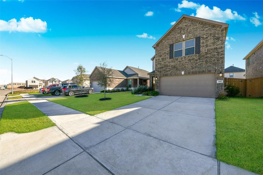 Exterior details and patio area of a home in Sunterra North, Katy (Image 4).