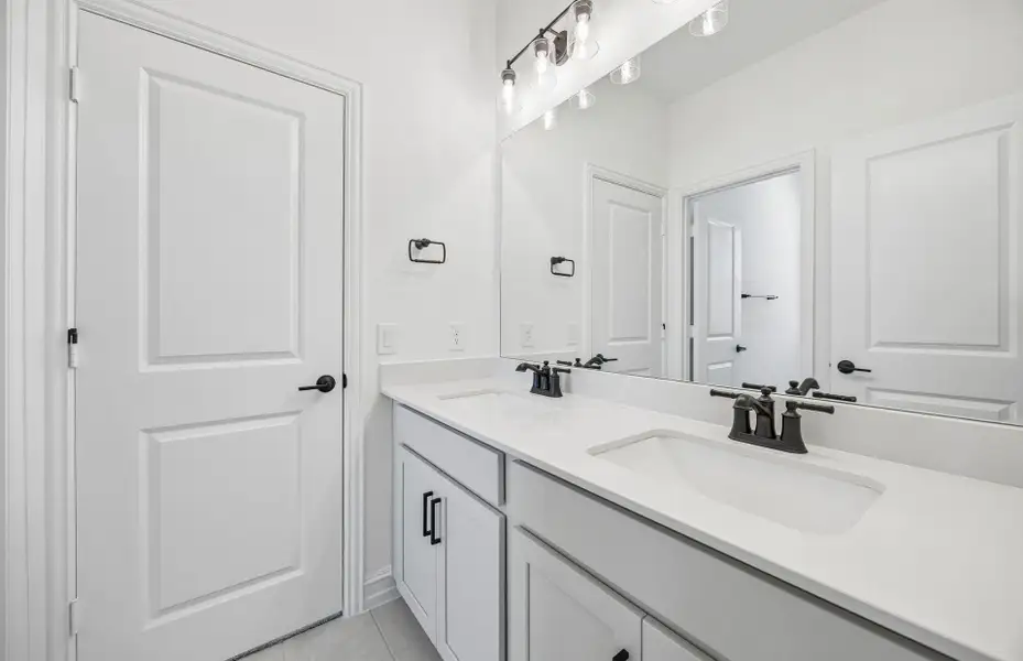 Furnished interior view inside a new home in Highland Lakes, McKinney (Image 12).
