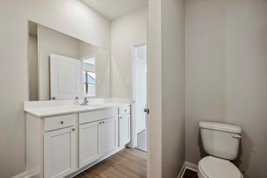 Furnished interior view inside a new home in Trails at Cochran Ranch, Waller (Image 10).