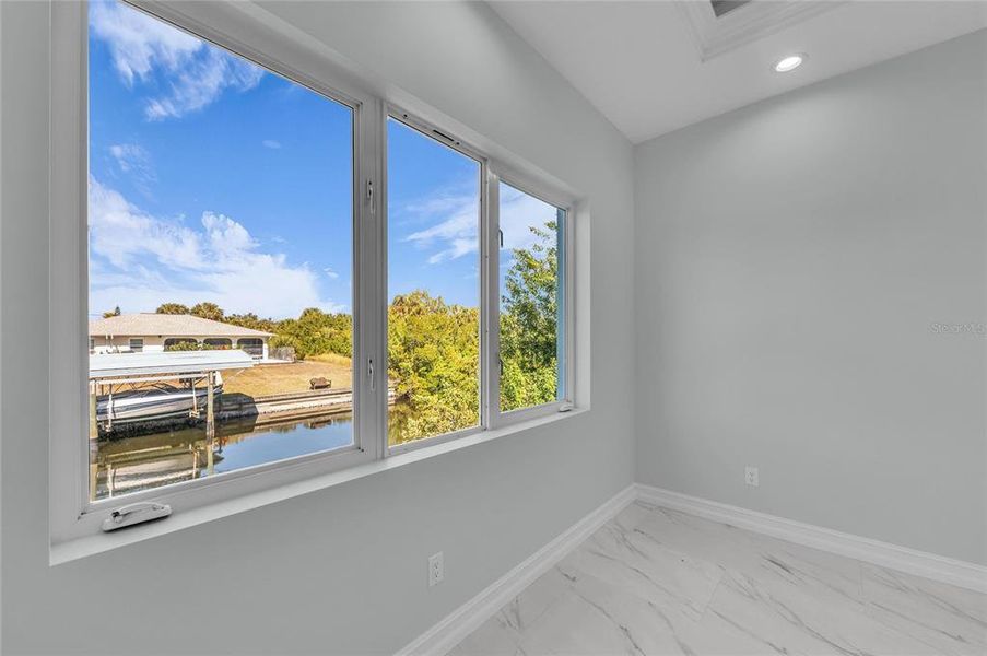Spacious, unfurnished interior of a new home in , Port Charlotte (Image 45).