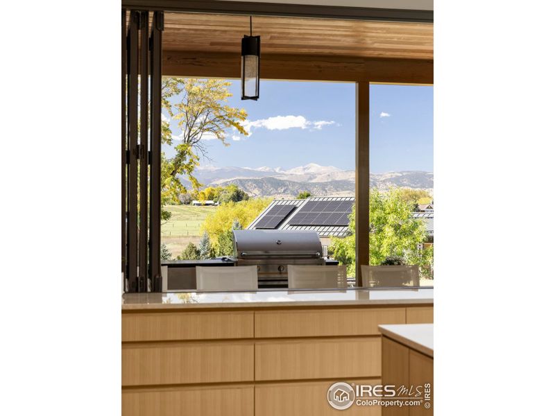 Indoor/outdoor kitchens with mountain views. Indoor/outdoor kitchens with mountain views.