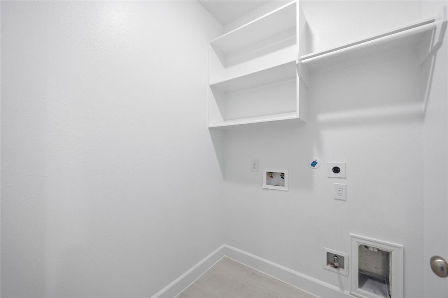 Effortless Functionality: Situated upstairs for utmost convenience, the utility room streamlines household tasks, blending seamlessly into the flow of your domestic life.