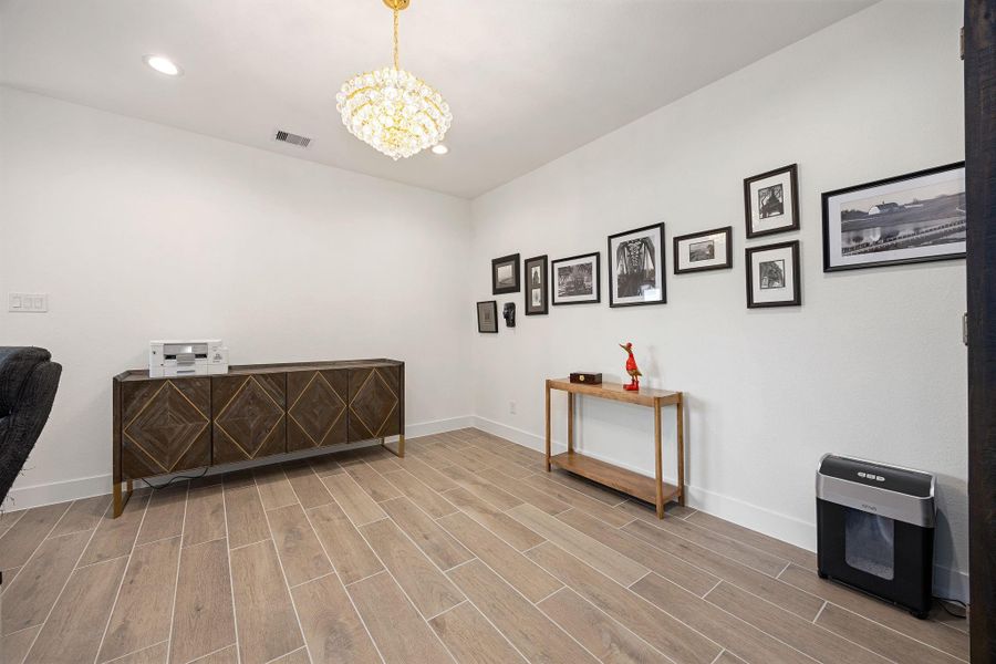 16 X 15 flex space/game room located on the first floor in between the two secondary bedrooms.