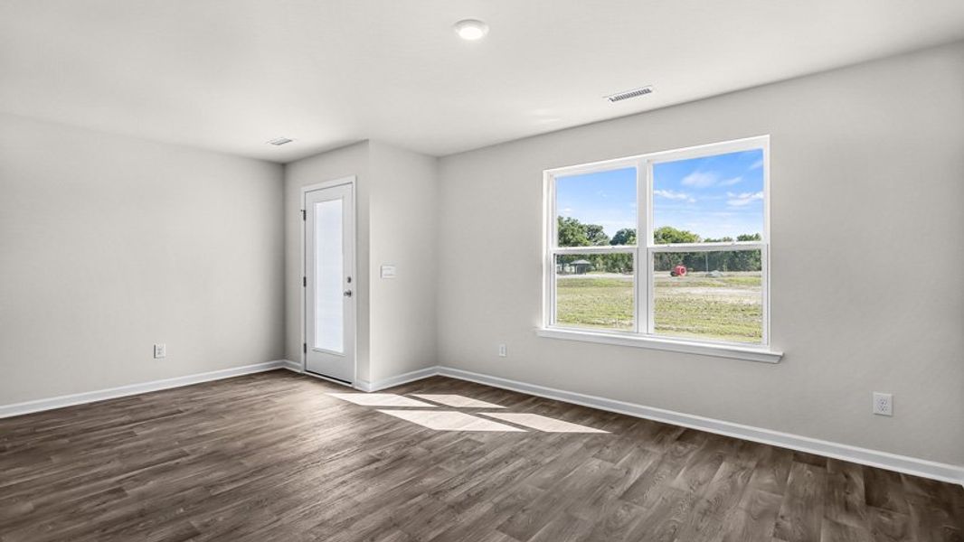 Spacious, unfurnished interior of a new home in Edinborough Townes, Gibsonville (Image 10).