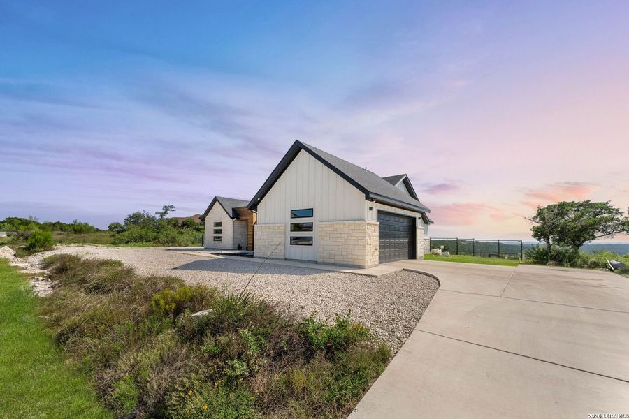 Front exterior of a new home in , Mico, TX, highlighting curb appeal (Image 30). Front exterior of a new home in , Mico, TX, highlighting curb appeal (Image 30).