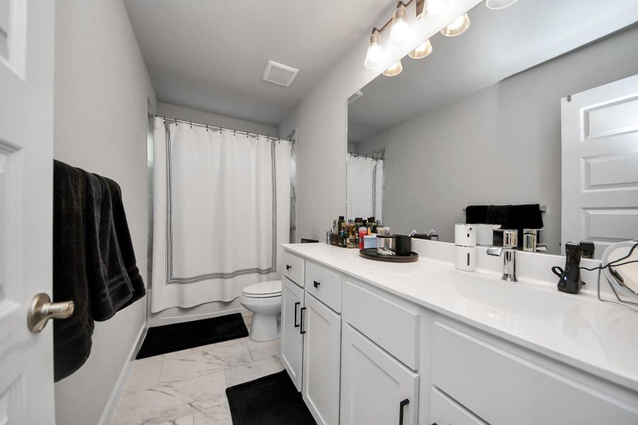 Furnished interior view inside a new home in , Conroe (Image 16).