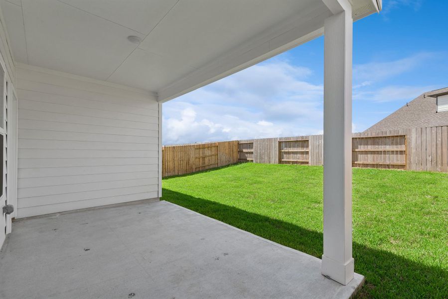 Exterior details and patio area of a home in The Canopies, Splendora (Image 2). Exterior details and patio area of a home in The Canopies, Splendora (Image 2).