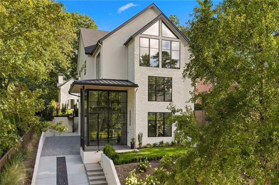Front exterior of a new home in , Atlanta, GA, highlighting curb appeal (Image 25).