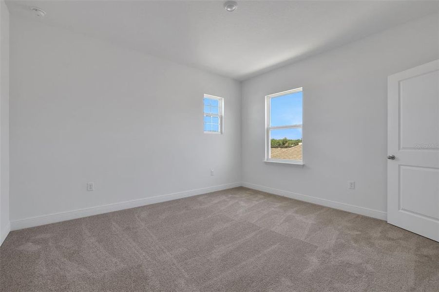 Spacious, unfurnished interior of a new home in Serenade at Ovation, Winter Garden (Image 18). Spacious, unfurnished interior of a new home in Serenade at Ovation, Winter Garden (Image 18).