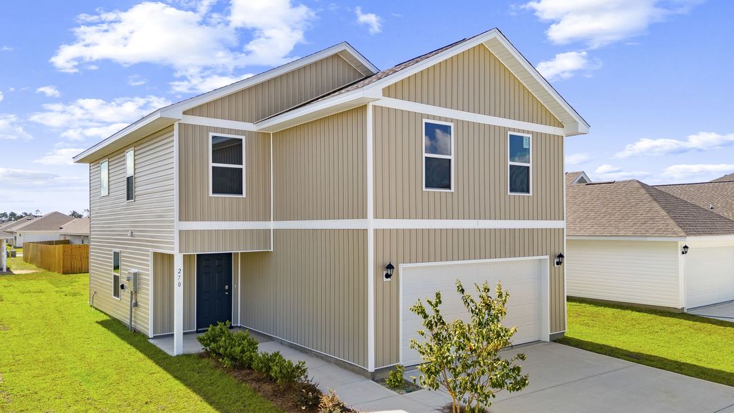 Front exterior of a new home in Park Place, Panama City, FL, highlighting curb appeal (Image 1). Front exterior of a new home in Park Place, Panama City, FL, highlighting curb appeal (Image 1).