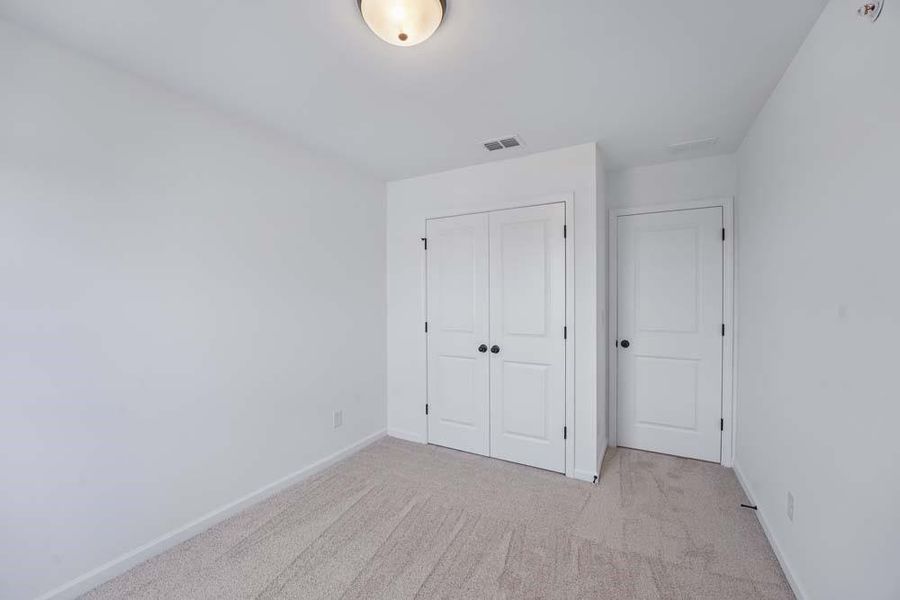 Spacious, unfurnished interior of a new home in Laurelwood, Douglasville (Image 29).