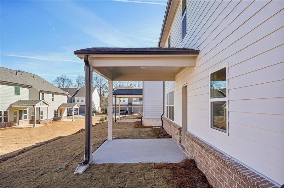 Exterior details and patio area of a home in Eastlyn Crossing - Single Family, Flowery Branch (Image 3). Exterior details and patio area of a home in Eastlyn Crossing - Single Family, Flowery Branch (Image 3).