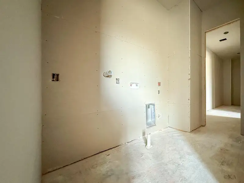 ***Estimated completion April 15, 2026. Showings by appointment only and must be accompanied due to active construction.*** Enjoy the ease of a utility room that connects directly to one of the primary closets—making laundry day effortless with immediate access for hanging and storing. ***Estimated completion April 15, 2026. Showings by appointment only and must be accompanied due to active construction.*** Enjoy the ease of a utility room that connects directly to one of the primary closets—making laundry day effortless with immediate access for hanging and storing.