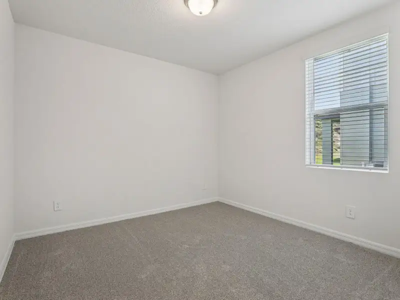 Spacious, unfurnished interior of a new home in The Meadow at Crossprairie, St. Cloud (Image 11).