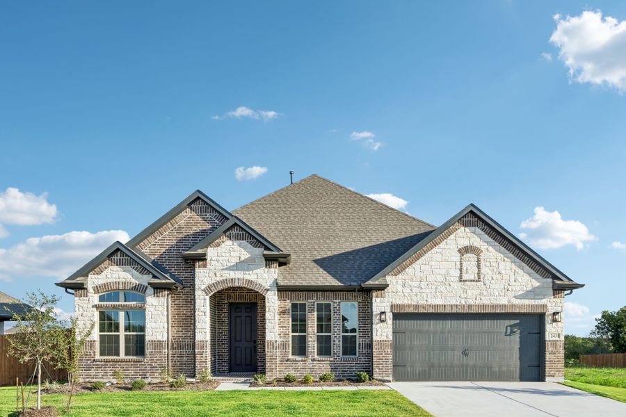 Front exterior of a new home in Sheppard's Place, Waxahachie, TX, highlighting curb appeal (Image 2). Front exterior of a new home in Sheppard's Place, Waxahachie, TX, highlighting curb appeal (Image 2).