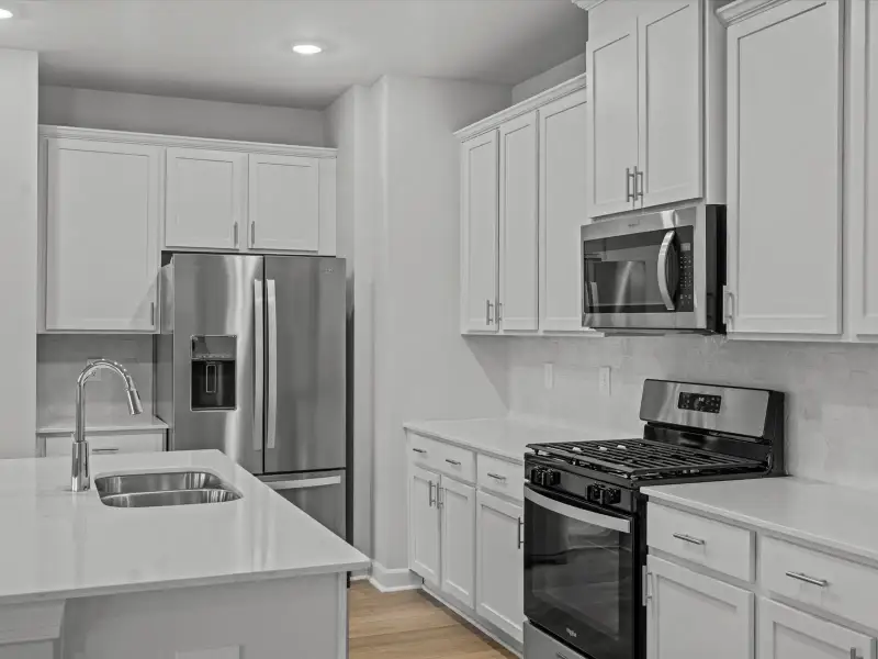 Furnished interior view inside a new home in The Farm at Wells Creek - Heritage Collection, Gray Court (Image 3).