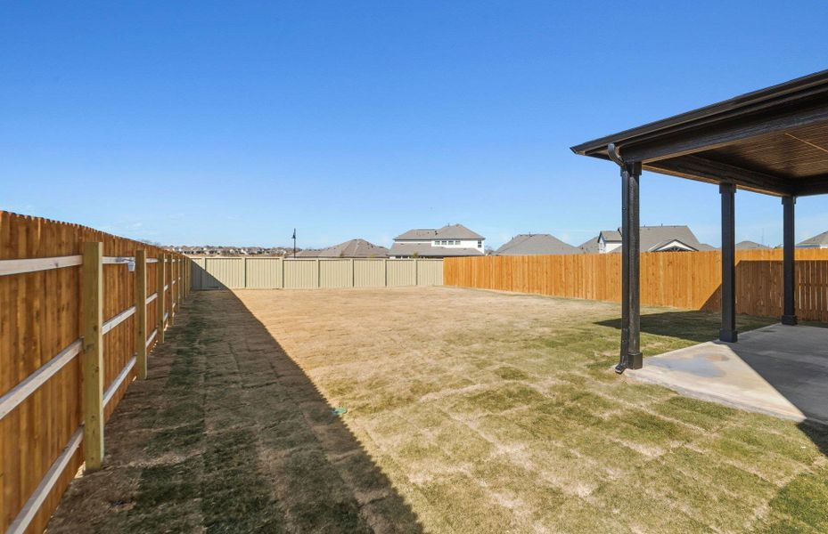 Exterior details and patio area of a home in Santa Rita Ranch, Liberty Hill (Image 4).
