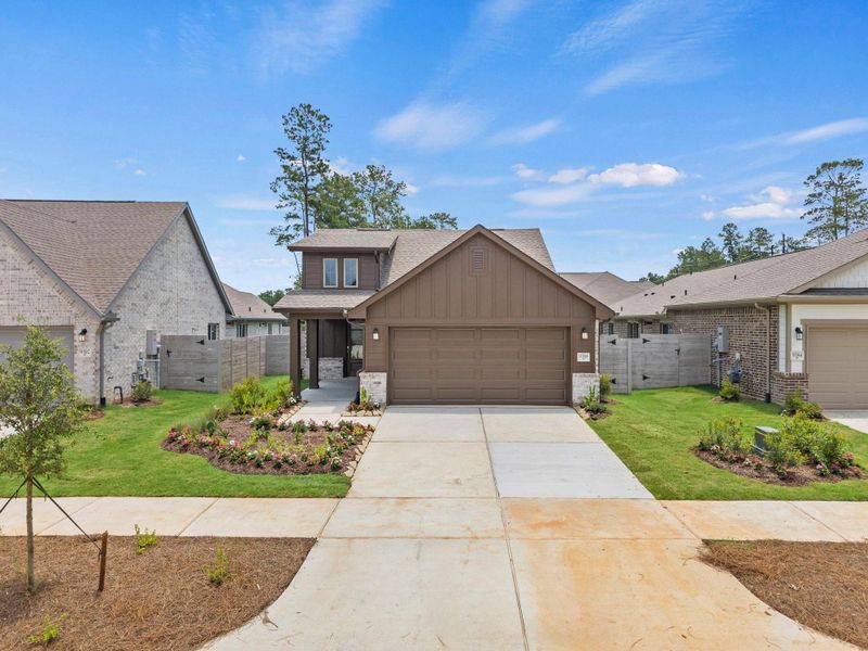 Front exterior of a new home in Two Step Farm, Montgomery, TX, highlighting curb appeal (Image 20). Front exterior of a new home in Two Step Farm, Montgomery, TX, highlighting curb appeal (Image 20).
