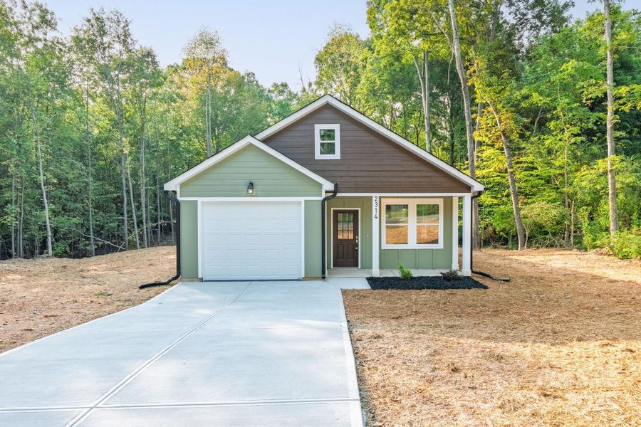 Front exterior of a new home in , Shelby, NC, highlighting curb appeal (Image 24).