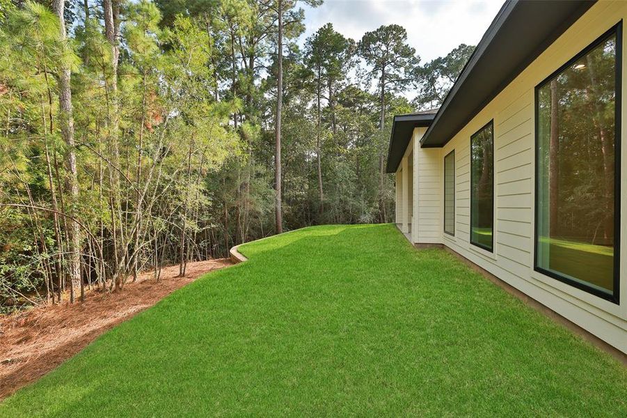 The grass and sprinkler system is already installed!