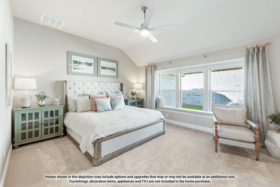 Bedroom with vaulted ceiling, ceiling fan, large windows, and neutral carpet flooring Bedroom with vaulted ceiling, ceiling fan, large windows, and neutral carpet flooring