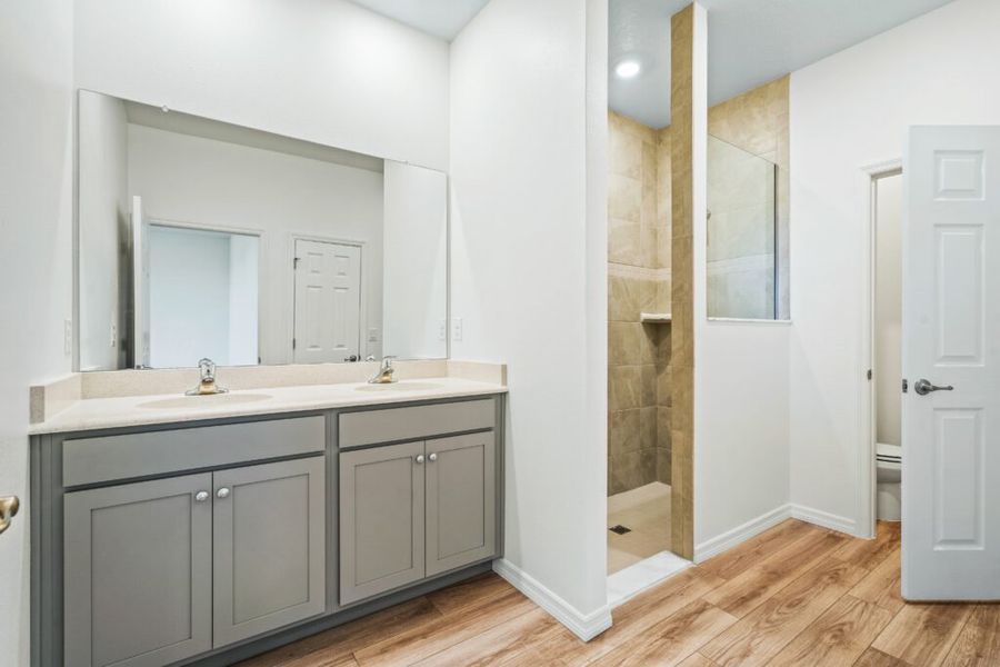 Representative furnished interior of a home built from the Jensen by Holiday Builders in Pineapple Grove, Port St. Lucie (Image 6).