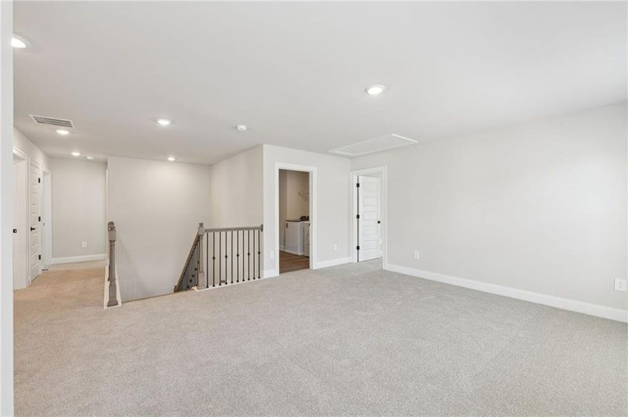 Spacious, unfurnished interior of a new home in Vines at Mill Creek - Estate Series, Braselton (Image 45).