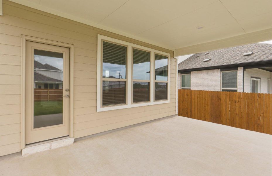 Exterior details and patio area of a home in Santa Rita Ranch, Liberty Hill (Image 3).