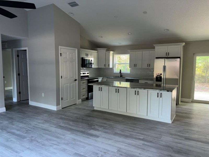 Furnished interior view inside a new home in , Dunnellon (Image 6).