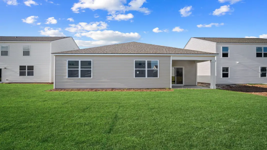 Front exterior of a new home in Rice Hope, Port Wentworth, GA, highlighting curb appeal (Image 21).