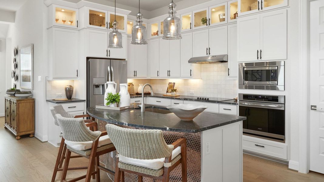 Representative furnished interior of a home built from the Mahogany by Brightland Homes in Sunterra, Katy (Image 4).