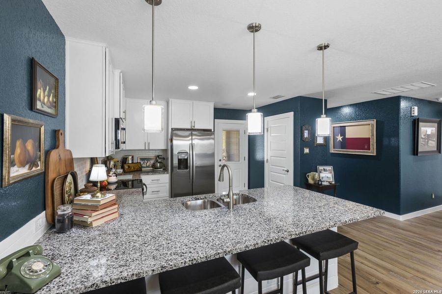 Furnished interior view inside a new home in , Bandera (Image 36).