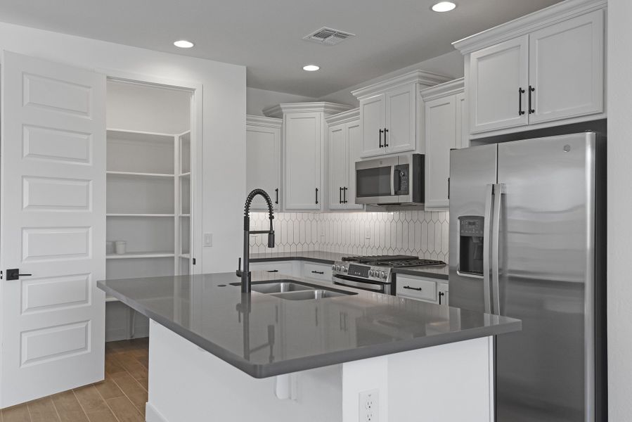 Furnished interior view inside a new home in CantaMia at Estrella 55+, Goodyear (Image 15).